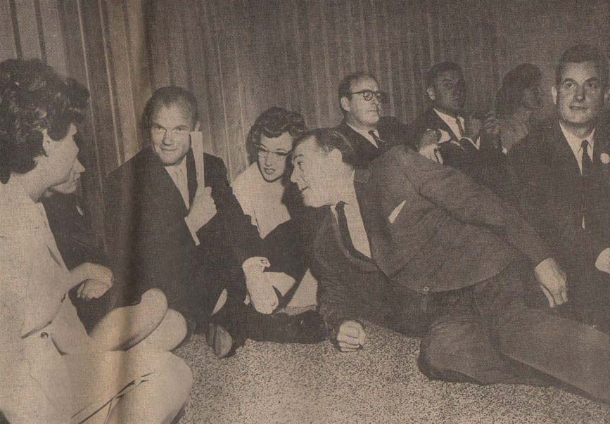 John Glenn and Sen. Magnuson chatting prior to movie at U.S. Science Pavilion, Seattle, 1962