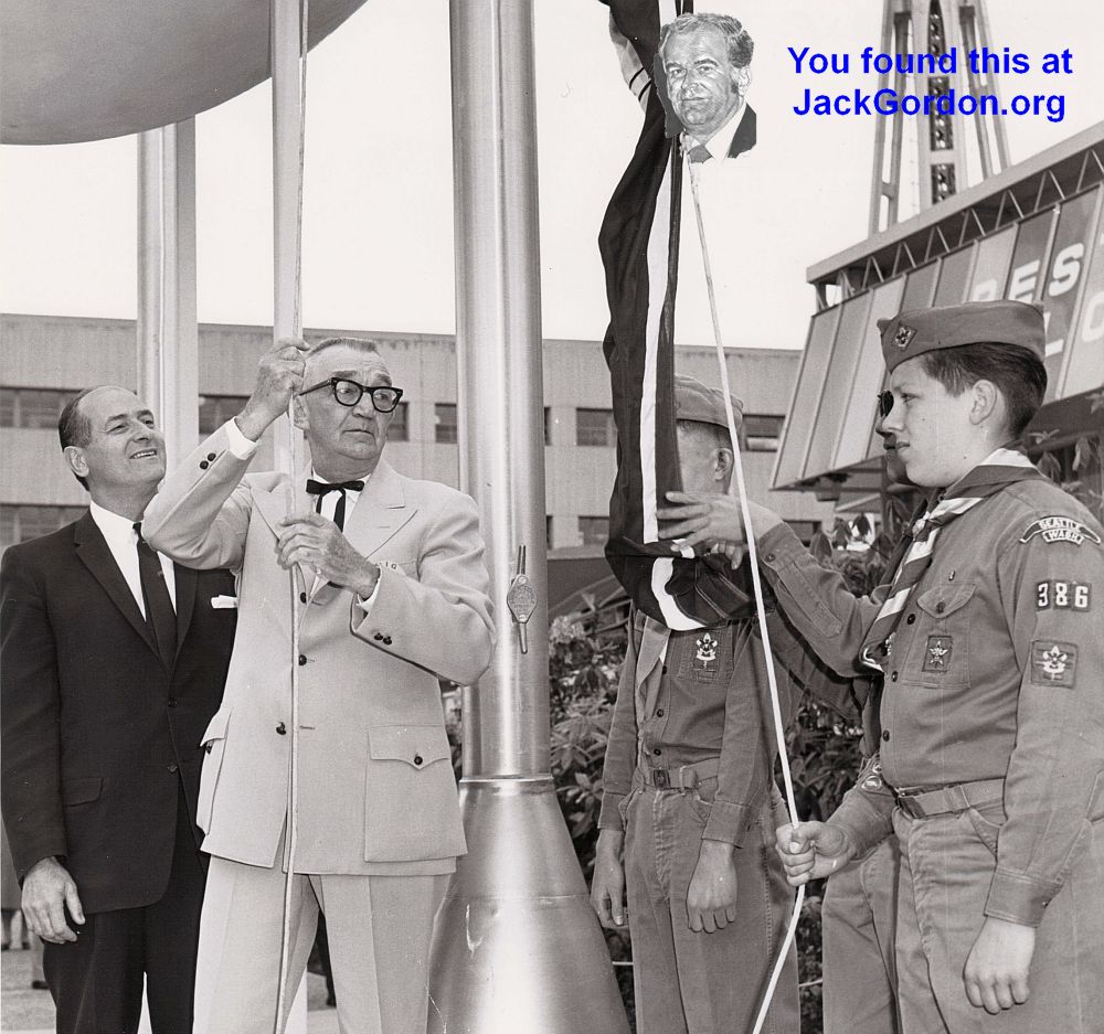 Wyoming Gov. Jack Gage raises his state's flag while Host Governor Albert D. Rosellini watches and Scouts of Troop 386 assist.